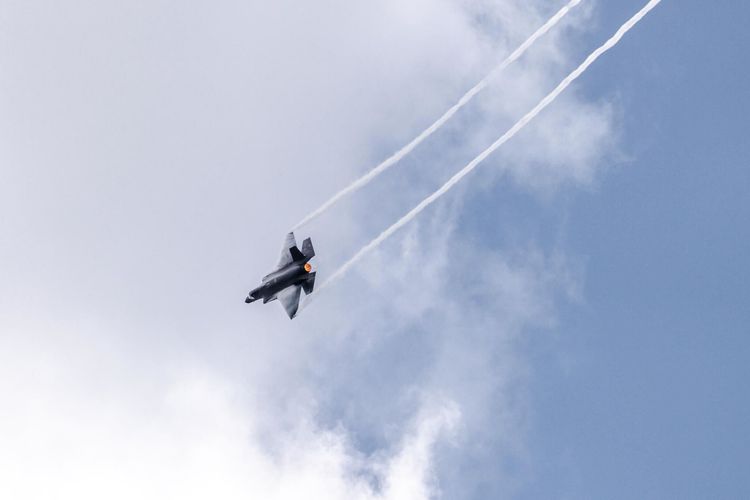 news_cross_domain_fires_capability